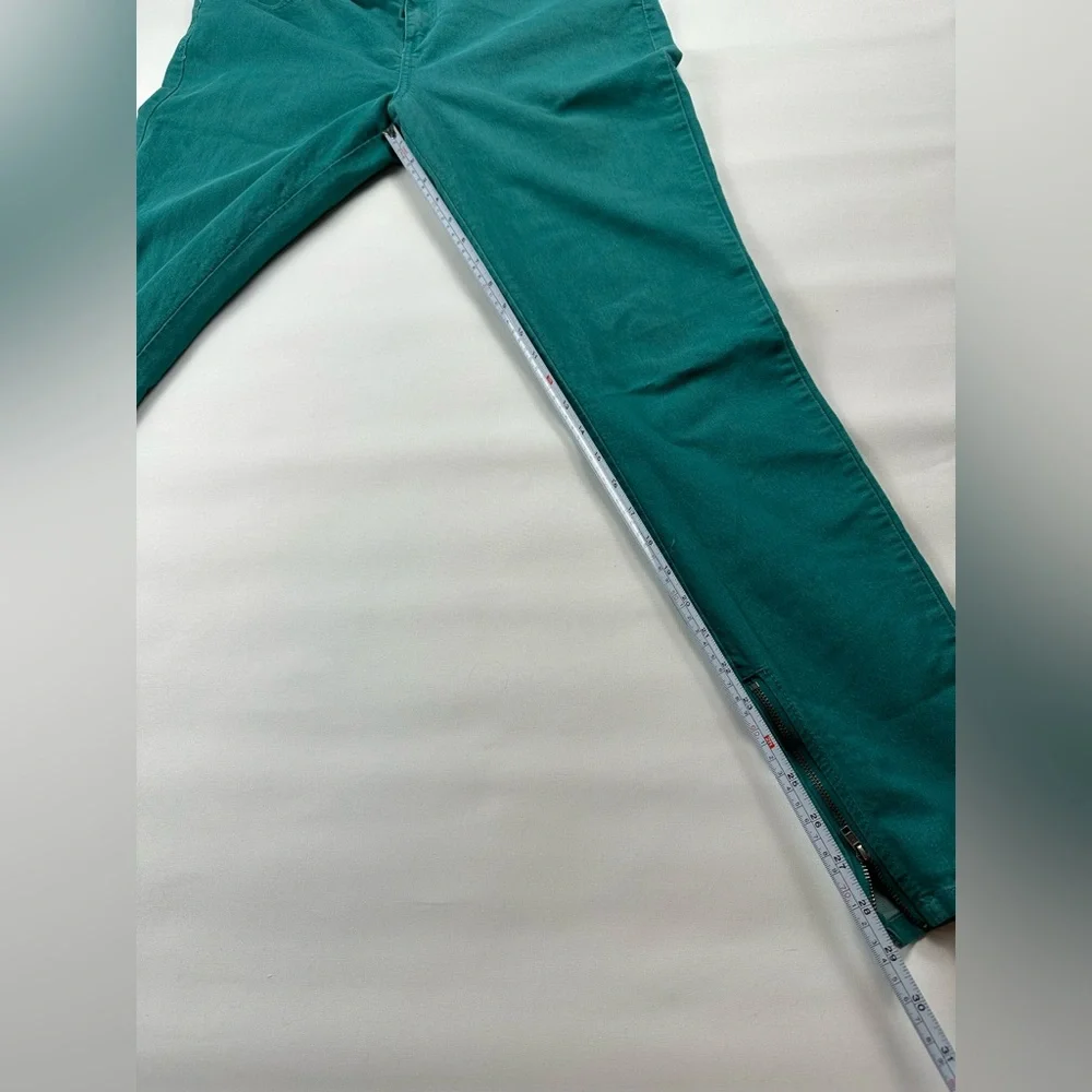 JLo straight jeans. Stretchy. Teal with zipper at ankle. Size 12